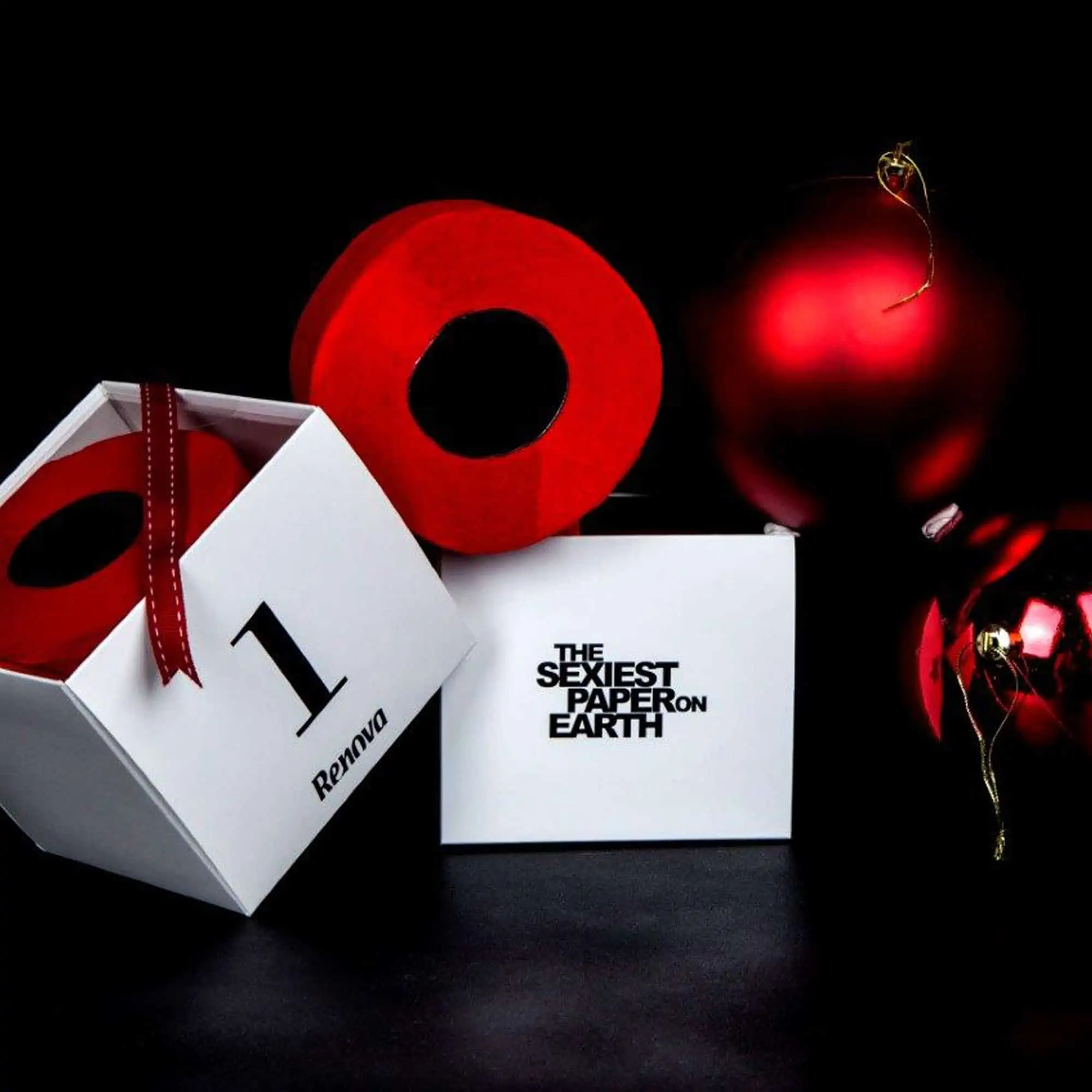 2 Red Toilet Paper Gift Boxes and Red Ornaments