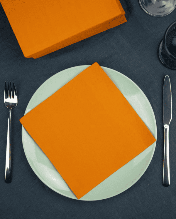 orange napkin on plate
