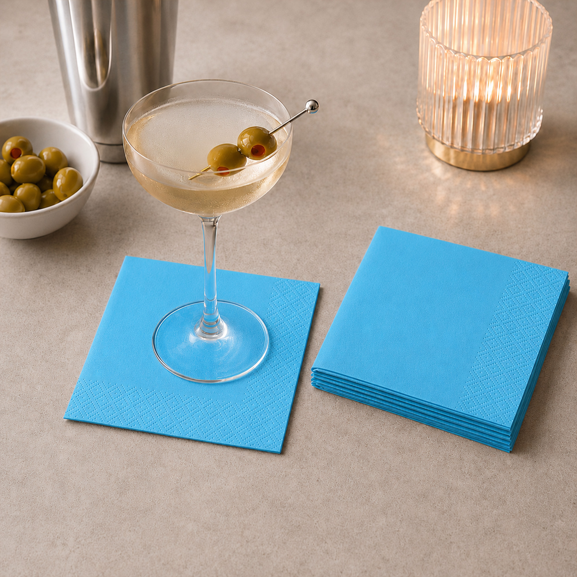 blue cocktail paper napkins styled on a party table