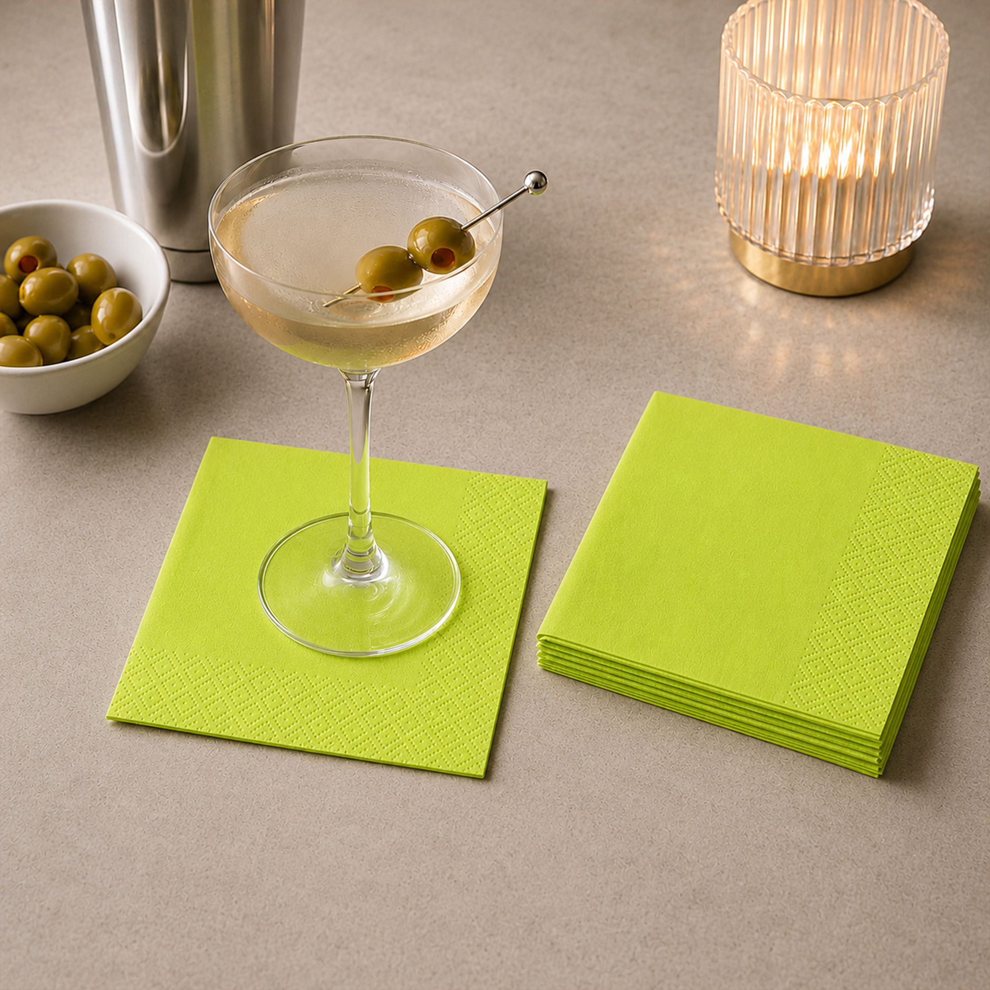lime green cocktail paper napkins styled on a party table